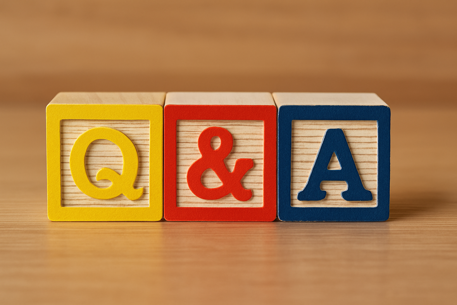 Colorful alphabet blocks arranged to spell “Q&A,” suggesting that the question-and-answer phase of the RFP process isn’t just reactive; it can be intentionally shaped to drive clarity and strengthen proposals.