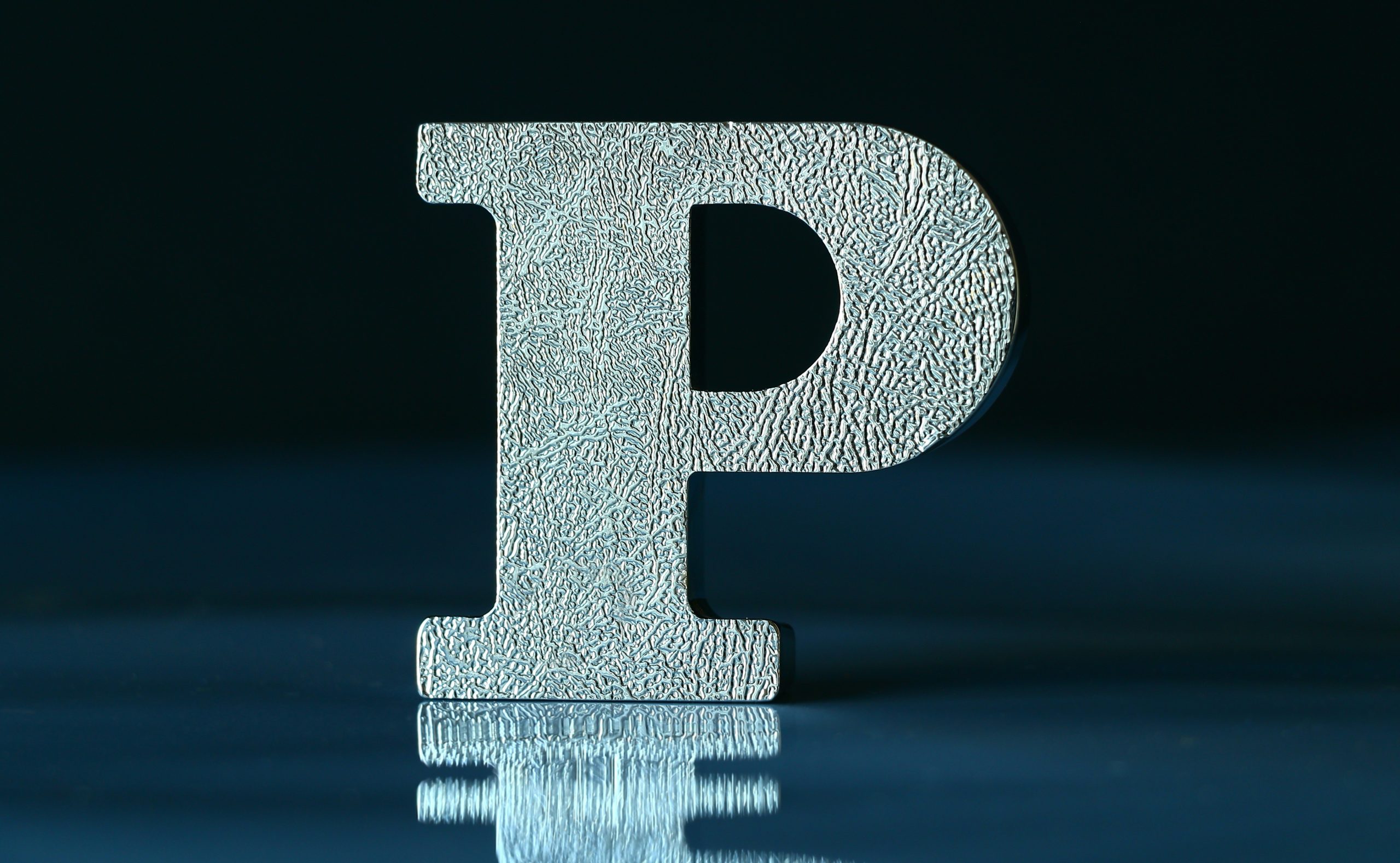 The letter P, reflected, stands for the 6 Ps of pitching: prioritization, proportion, preparation, personality, perspective, proof.